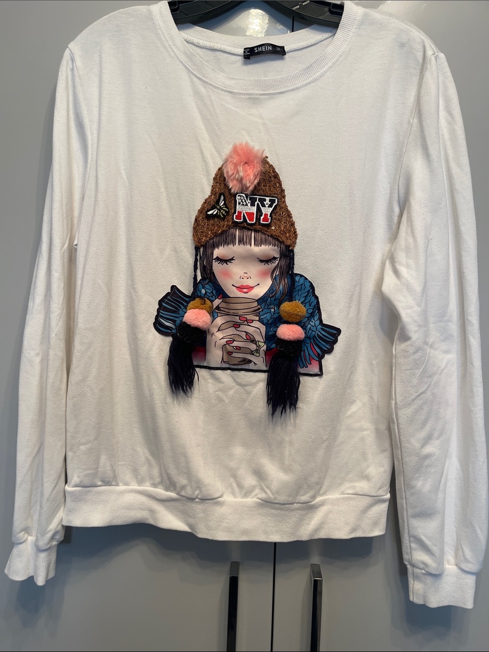 SHEIN White Pullover Sweatshirt with Printed Girl and Pom-Pom Accents